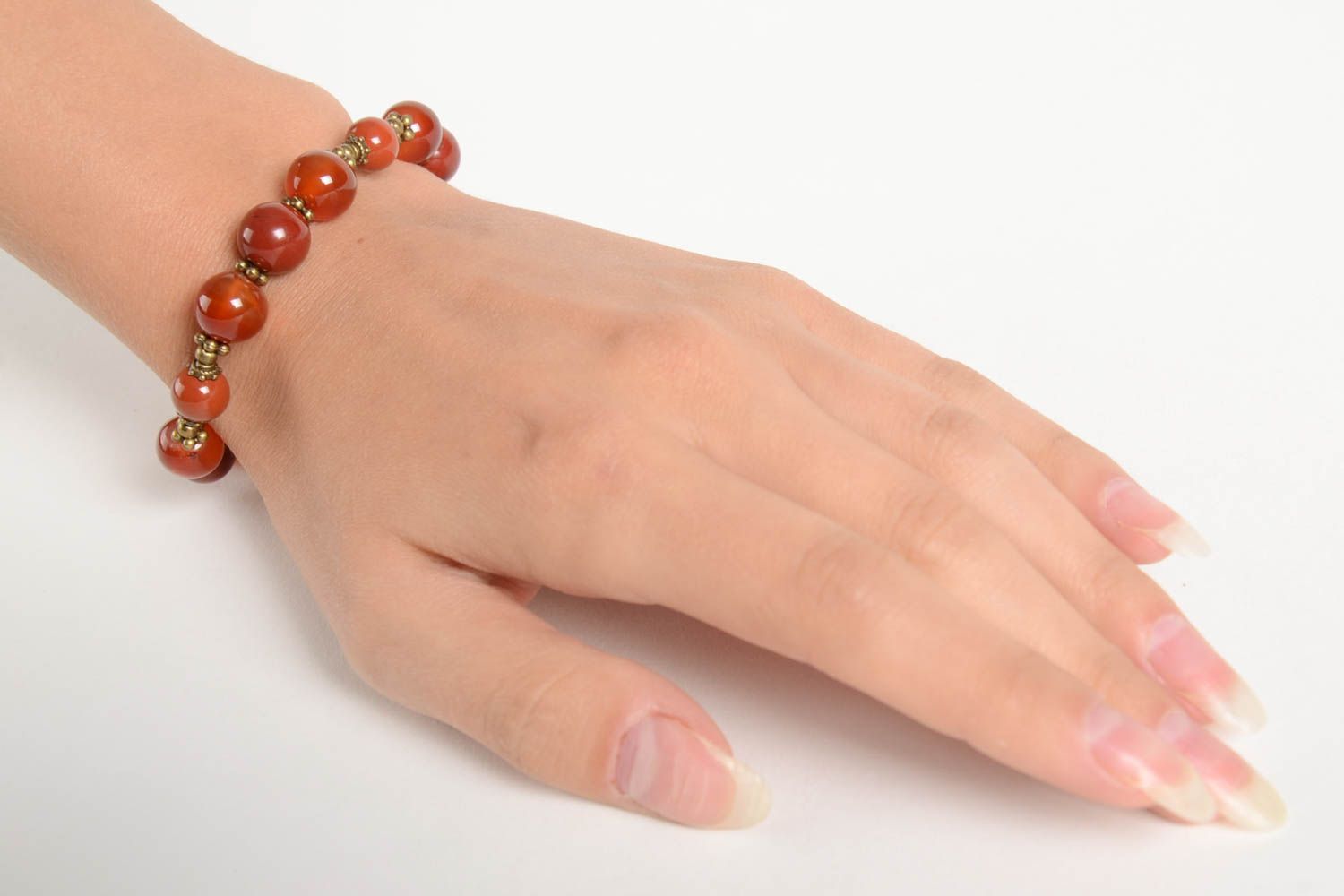 Pale red natural stones beaded adjustable bracelet with bronze charms for girls photo 2