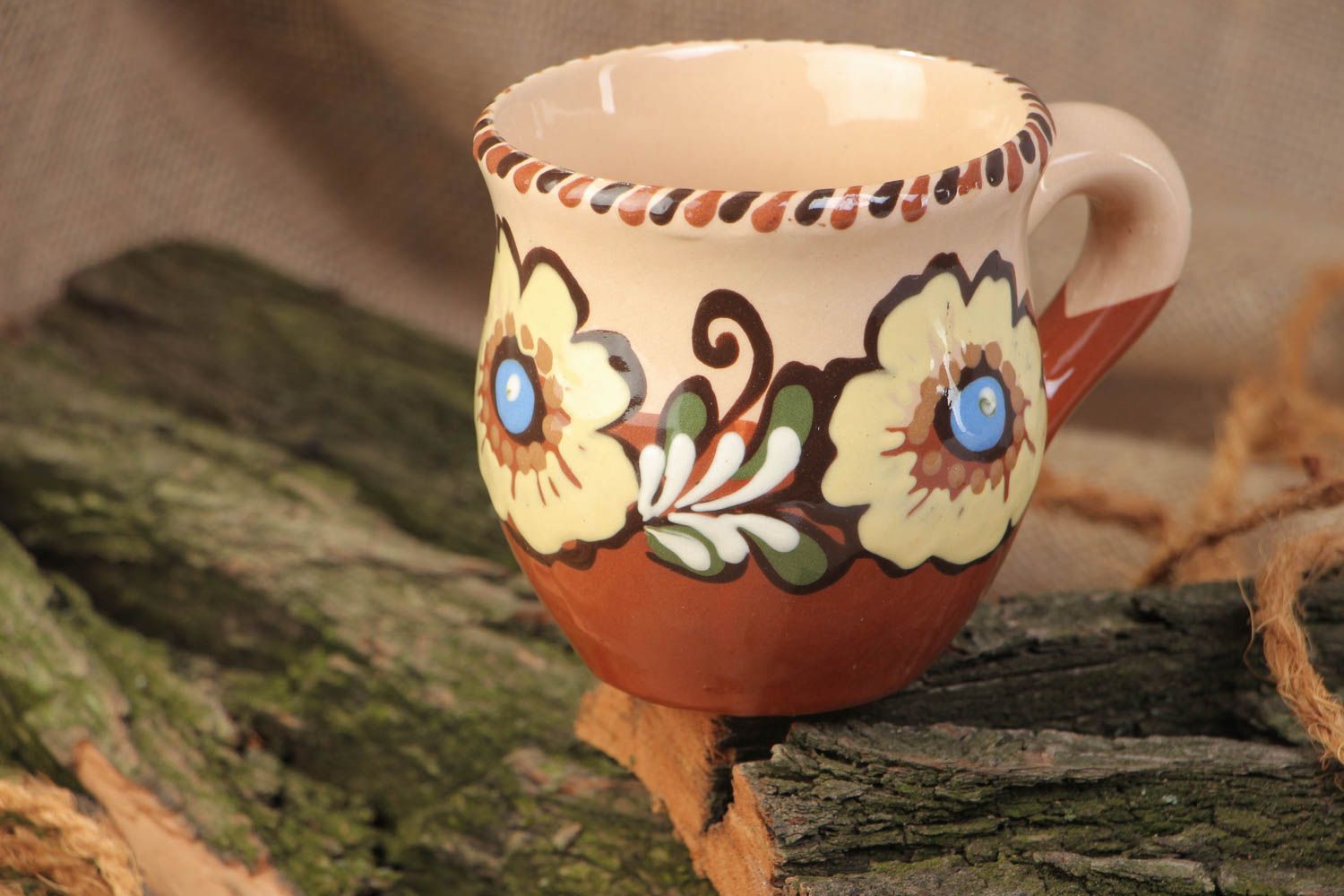8 oz ceramic glazed clay drinking handmade cup with handle in brown and beige color with floral pattern photo 1