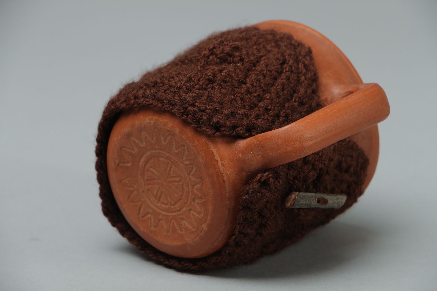 Ceramic cup in terracotta color with knitted back cozy cover photo 3