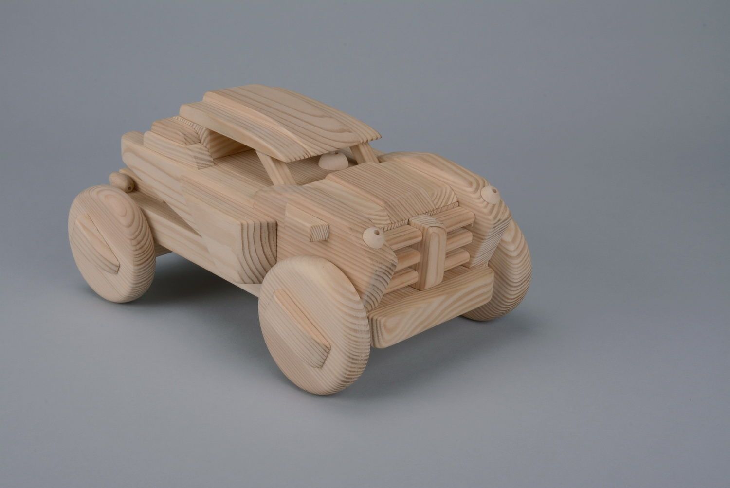 Little car made of wood photo 2
