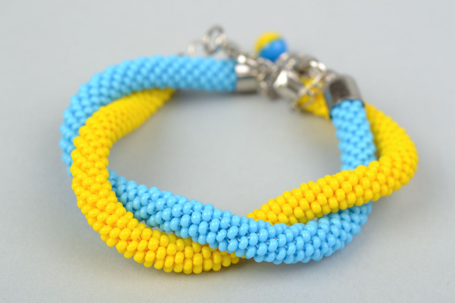 Set of 2 handmade beaded cord wrist bracelets of yellow and blue colors  photo 5