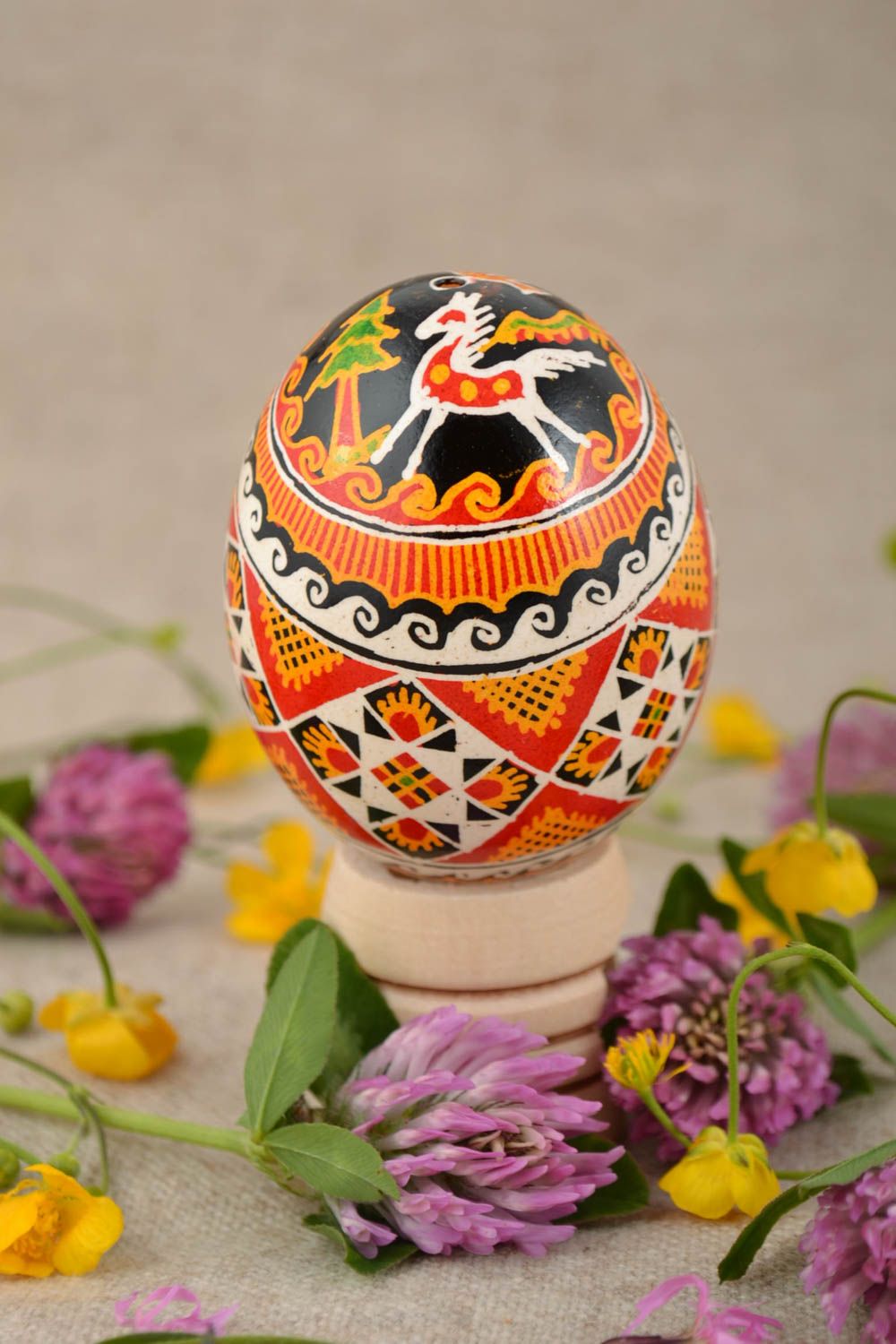 Beautiful handmade painted Easter egg with folk ornaments photo 1