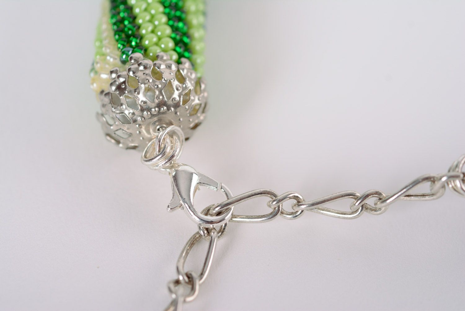 Handmade designer beaded cord necklace of green color with ornament photo 4