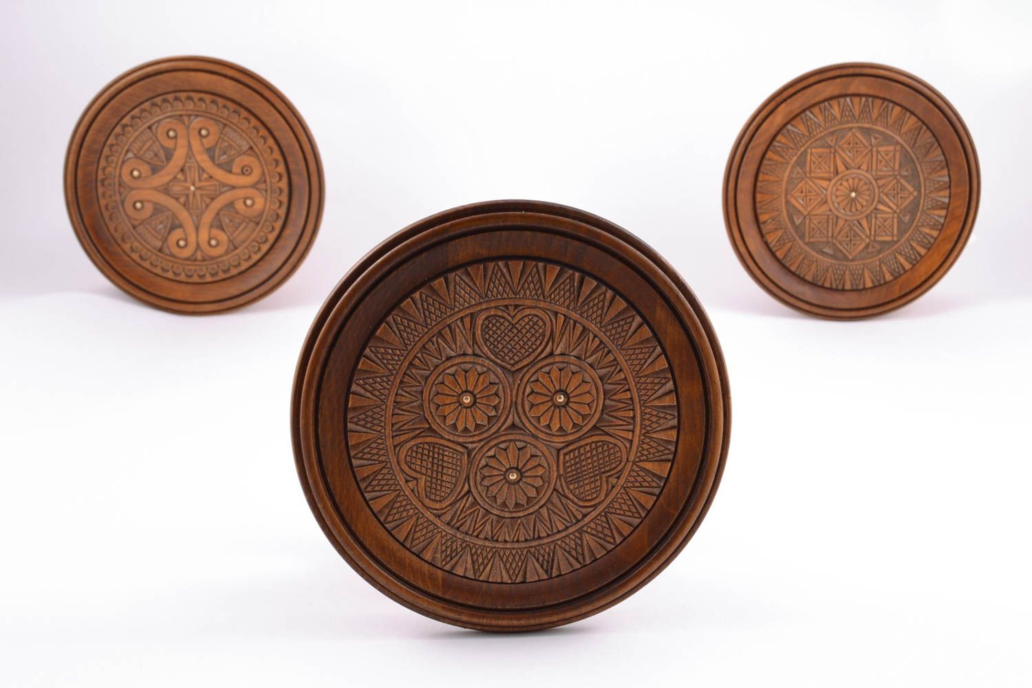 Carved wooden plate inlaid with metal inserts photo 5
