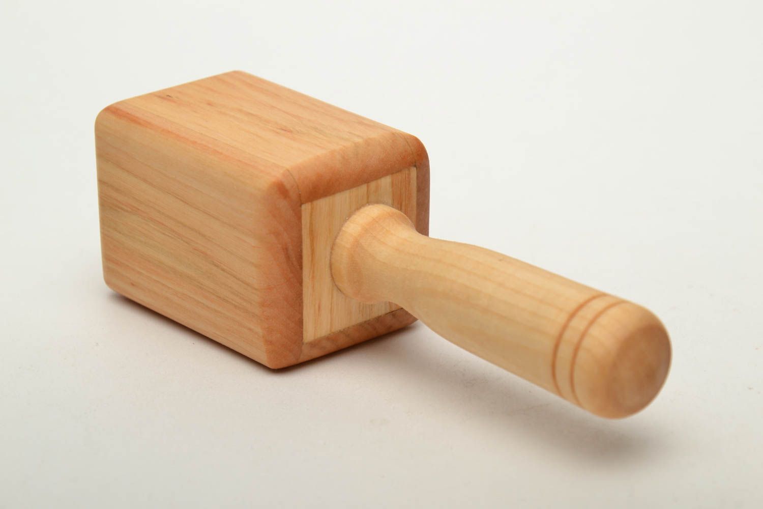 Wooden toy rattle photo 3