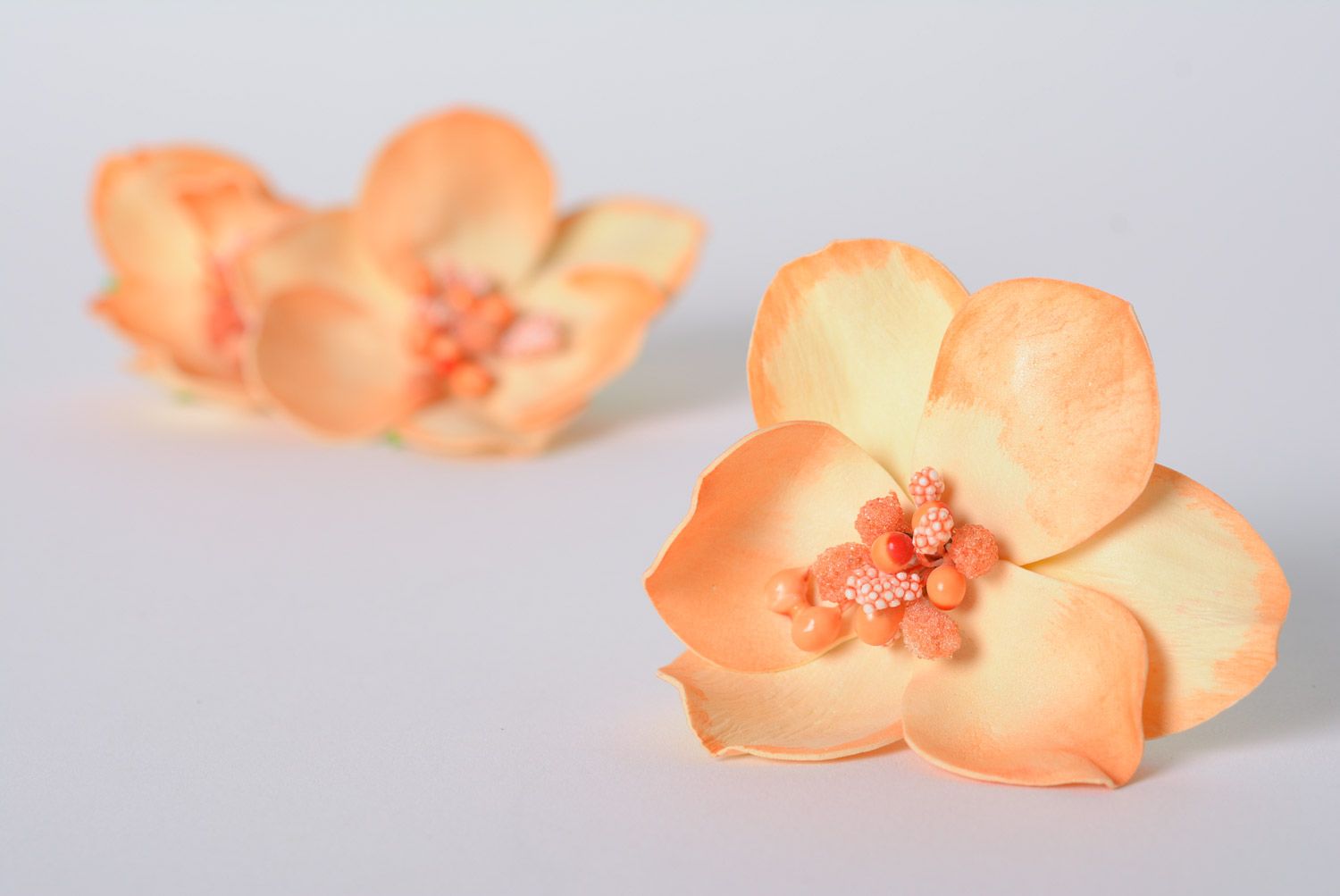 Handmade beautiful orange plastic hair pin made of suede and foamiran orchid flower photo 1