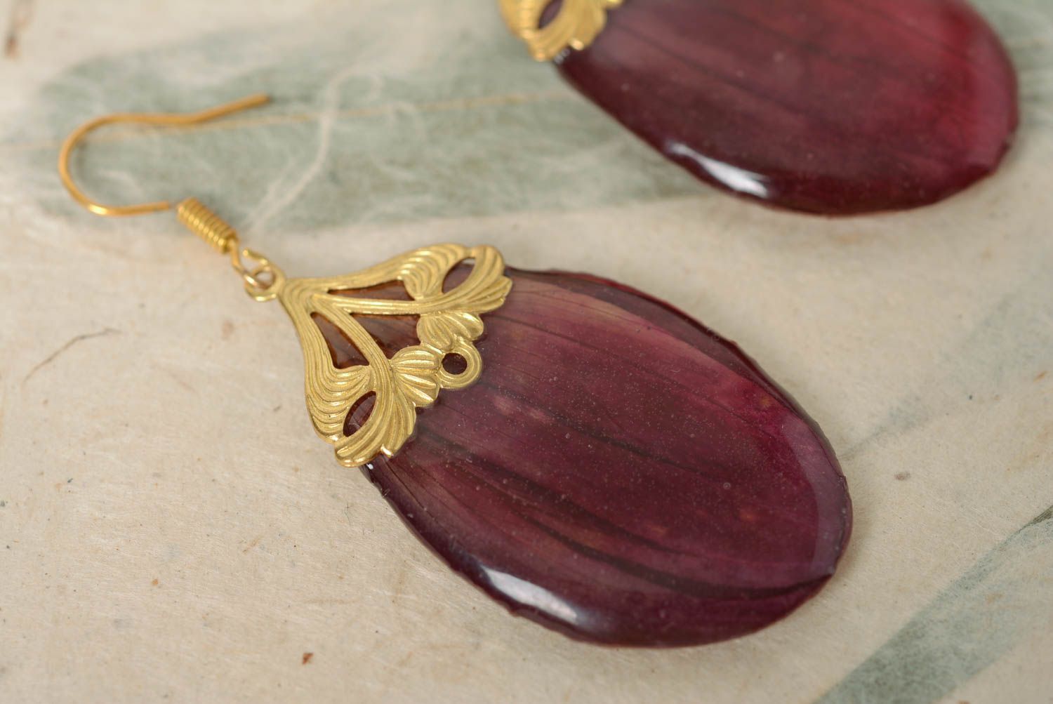 Handmade designer earrings with dark purple flower petals in epoxy resin photo 4