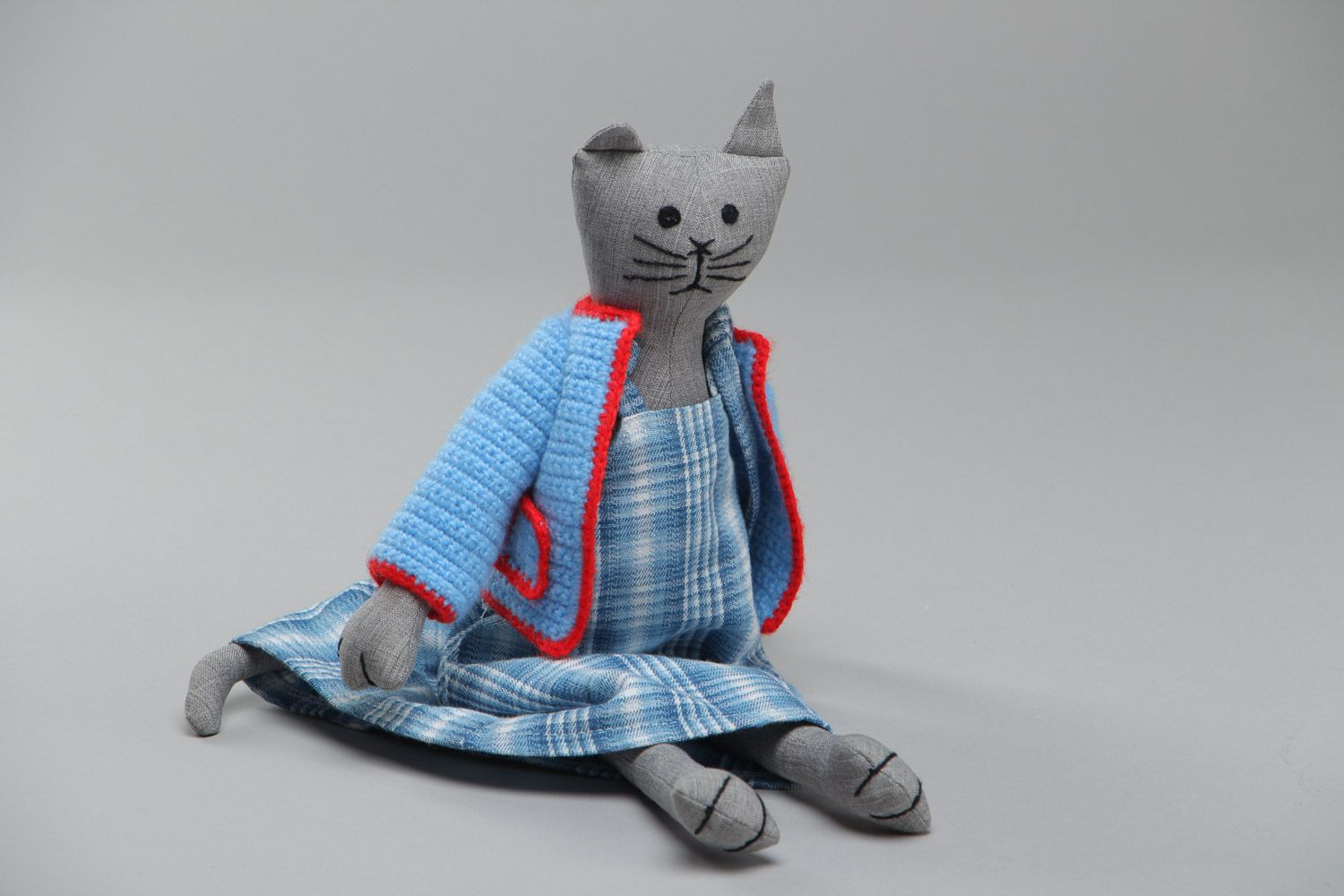 Homemade soft toy sewn of cotton Kitten in checkered sun dress and jacket photo 2