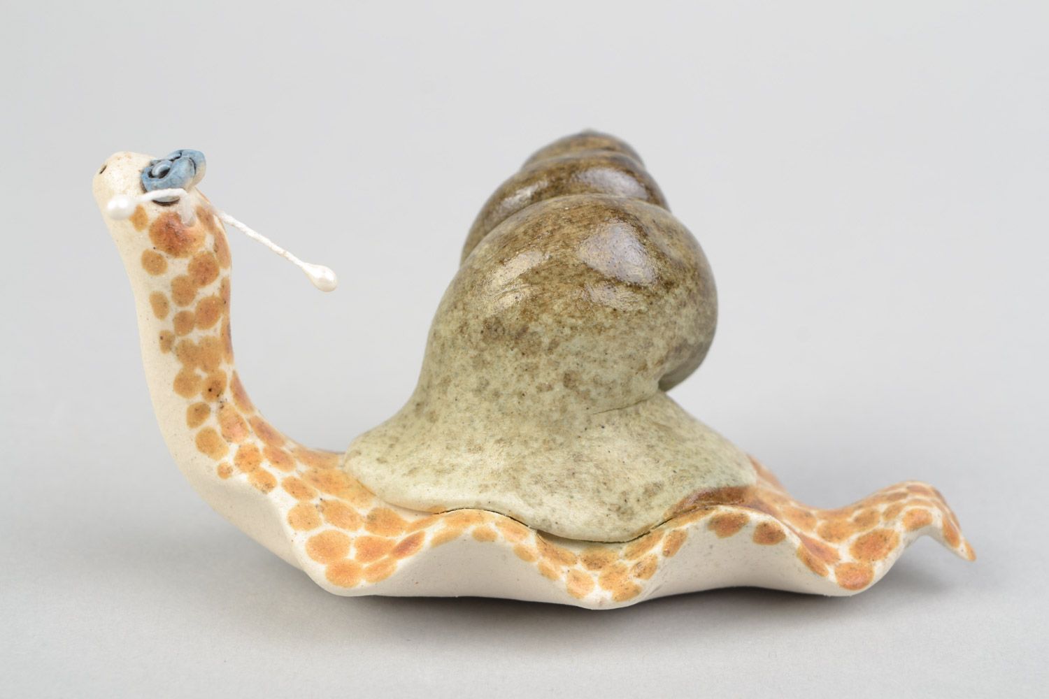 Handmade funny decorative ceramic figurine of smiling snail painted with glaze photo 4
