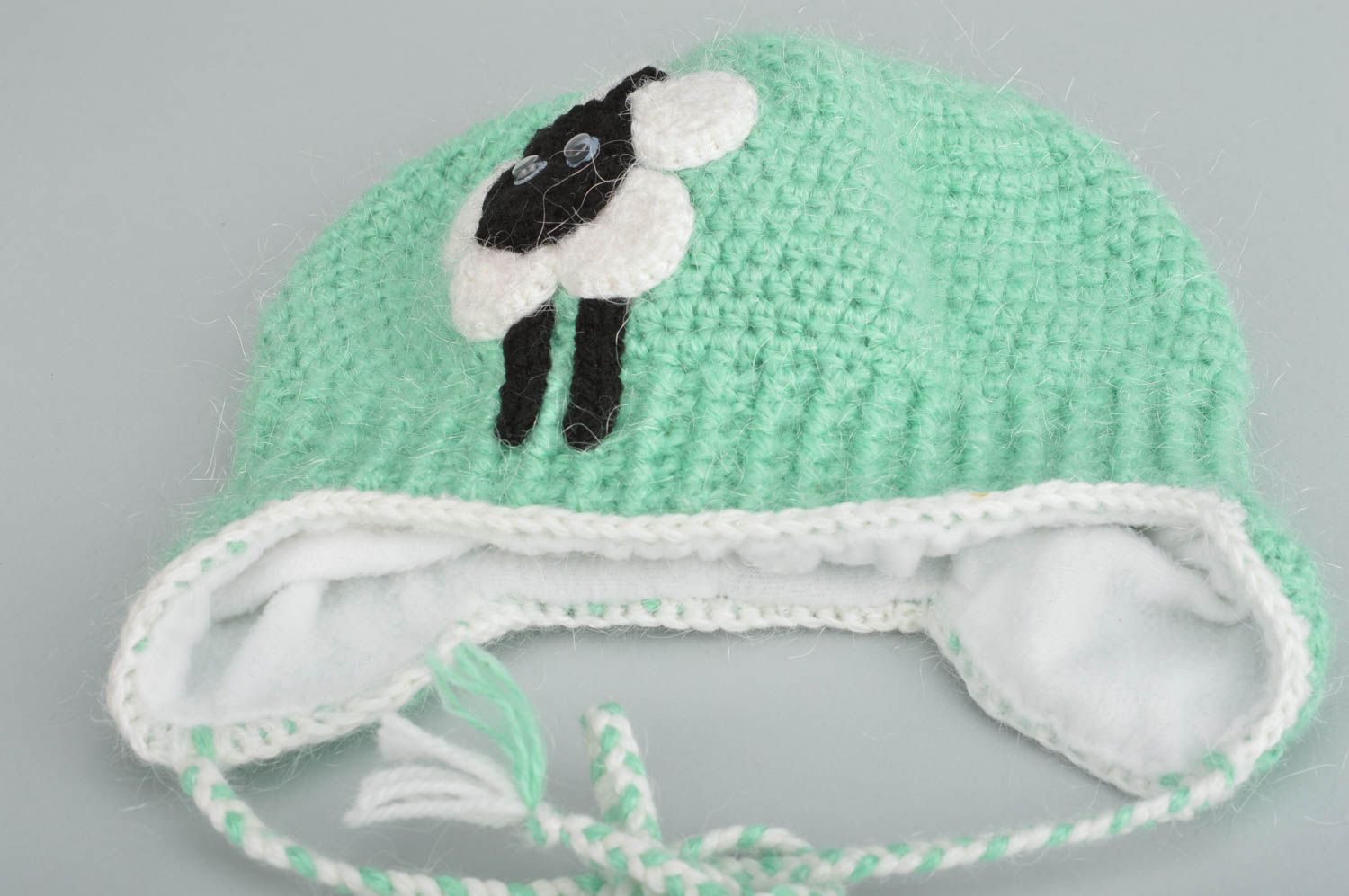 Beautiful handmade woven cap with sheep of mint color made of acrylics for kids photo 2