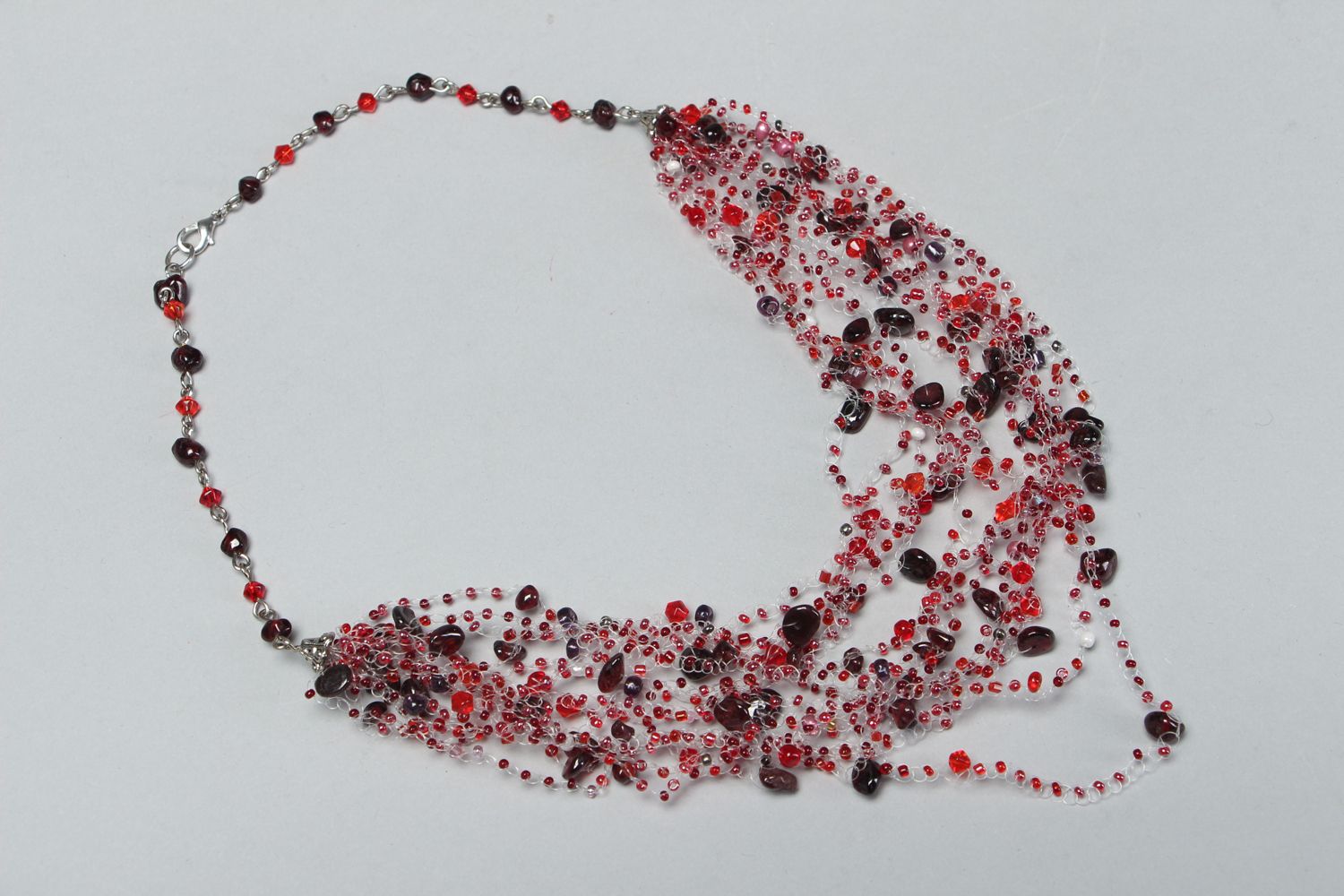 Beaded necklace with garnet and crystal photo 1