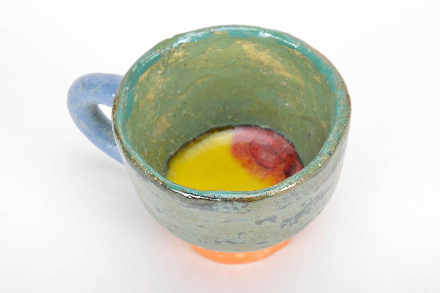5 oz glazed hand-molded clay drinking cup in green, orange, blue color photo 4