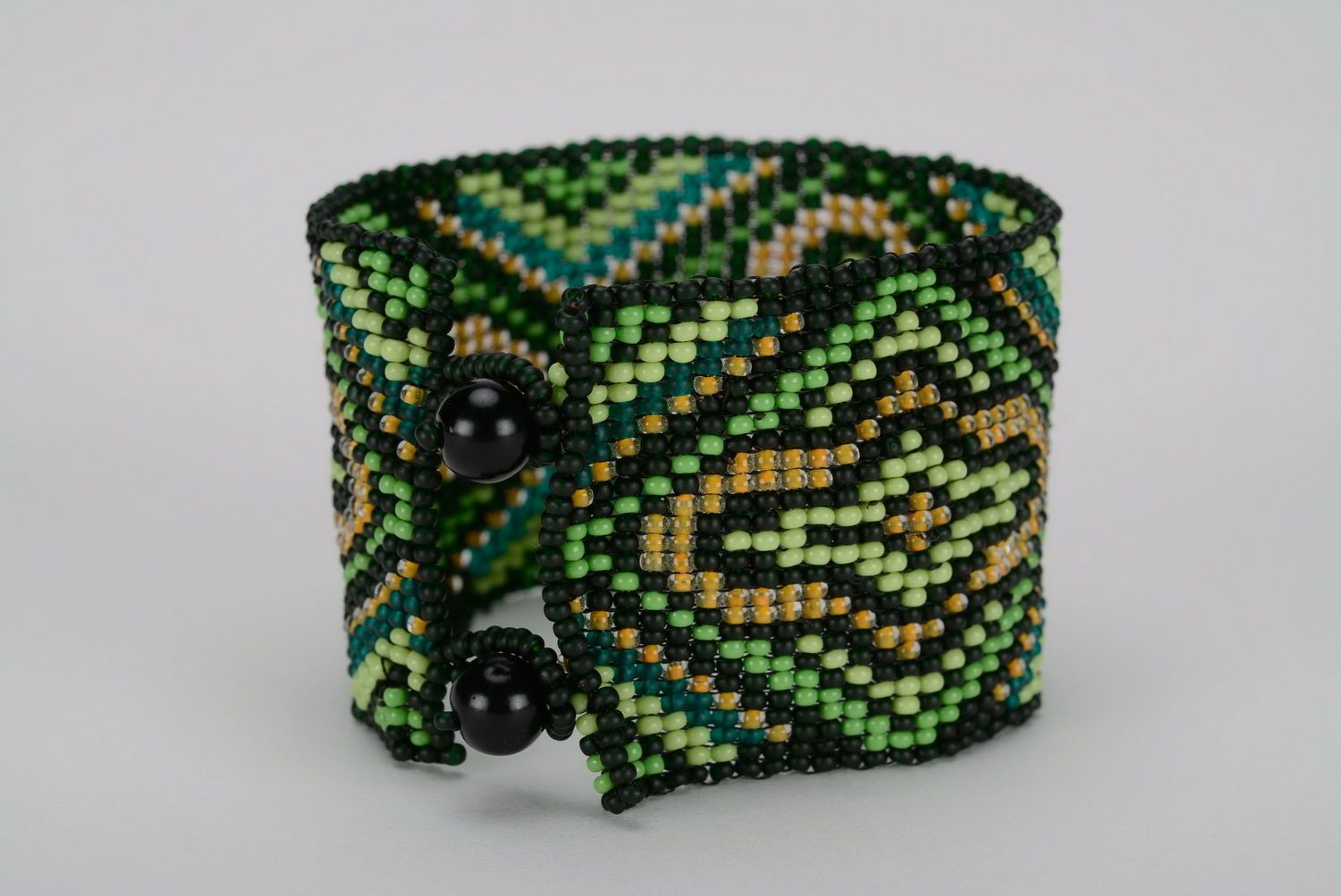 Wide ethnic beaded bracelet dark green and black yellow bracelet photo 2