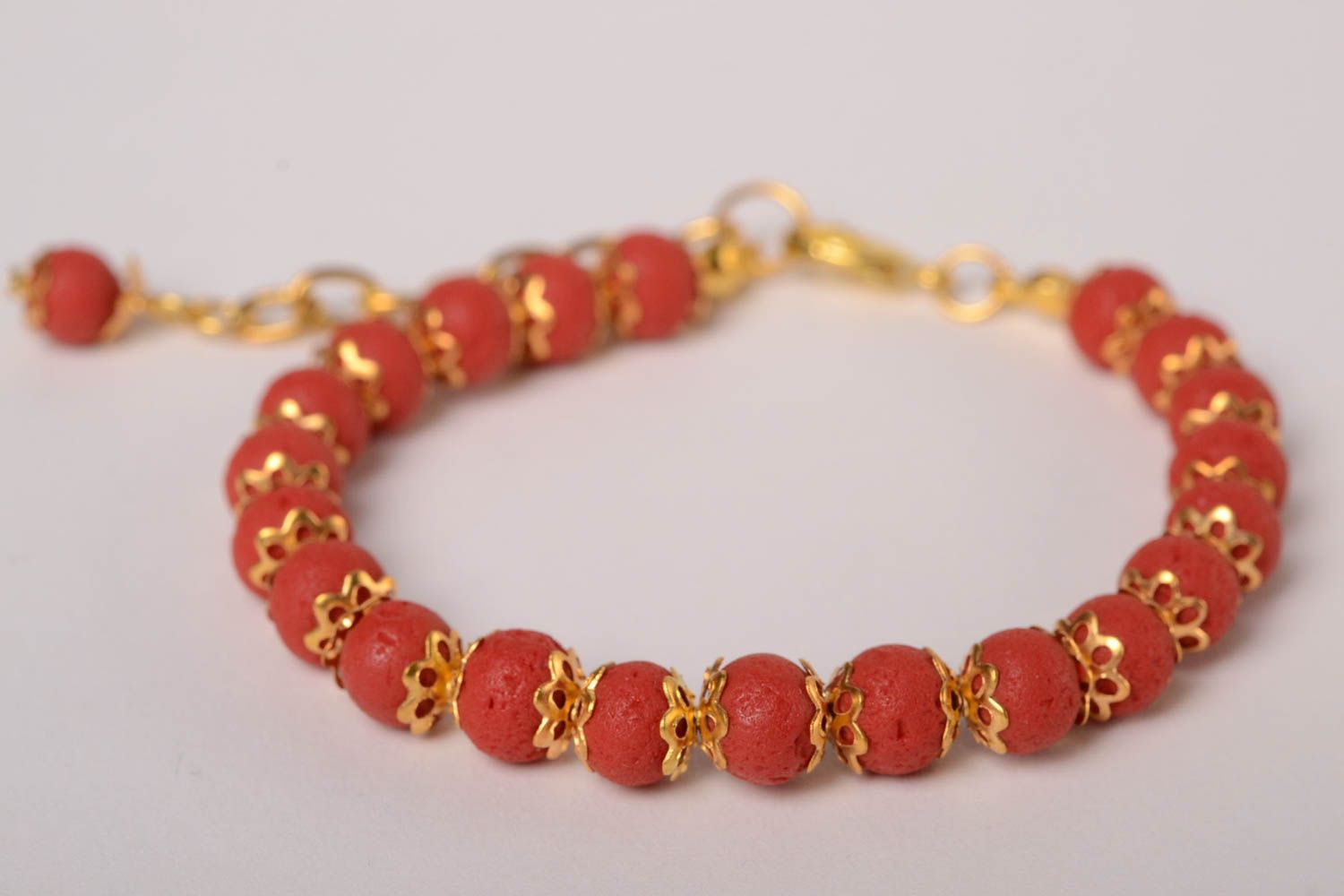 Women's handmade ball bracelet with red beads  photo 1