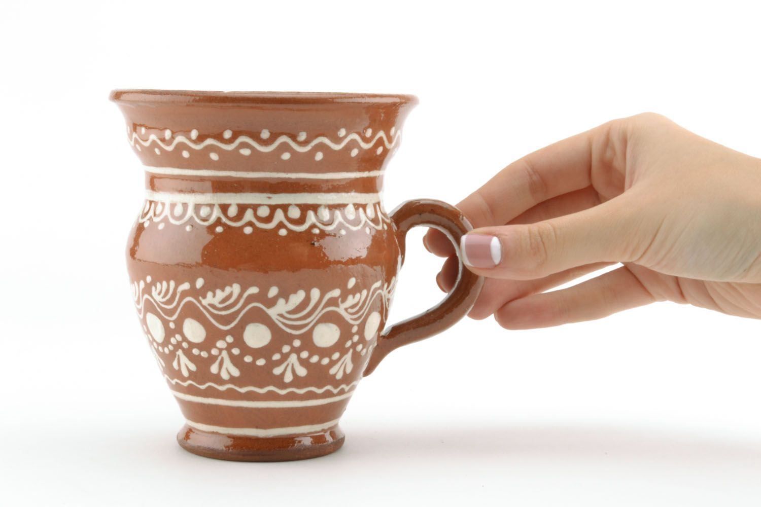 Decorative clay glazed drinking cup in pitcher shape with handle and white ethnic pattern photo 3