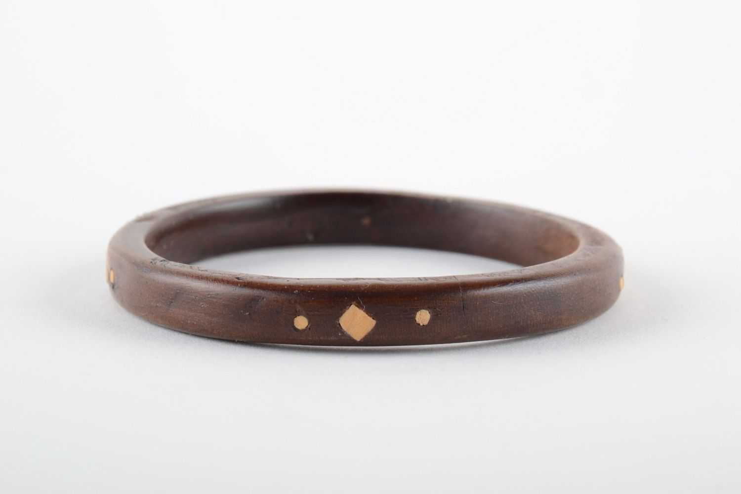 Thin dark handmade varnished wooden wrist bracelet with inlay for women photo 1