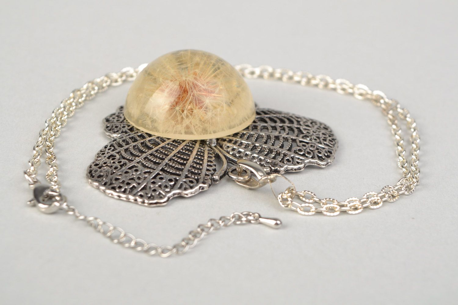 Tender handmade round pendant with dandelion flower in epoxy resin on chain  photo 5