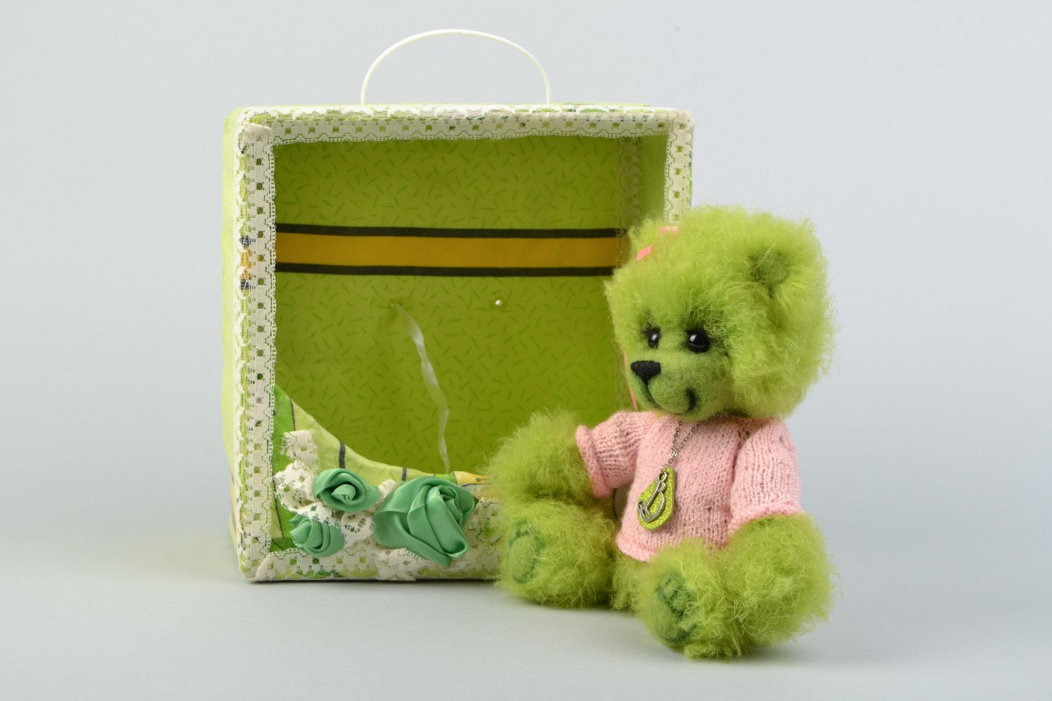 Handmade collectible crocheted soft toy bear in a box of light green color photo 5