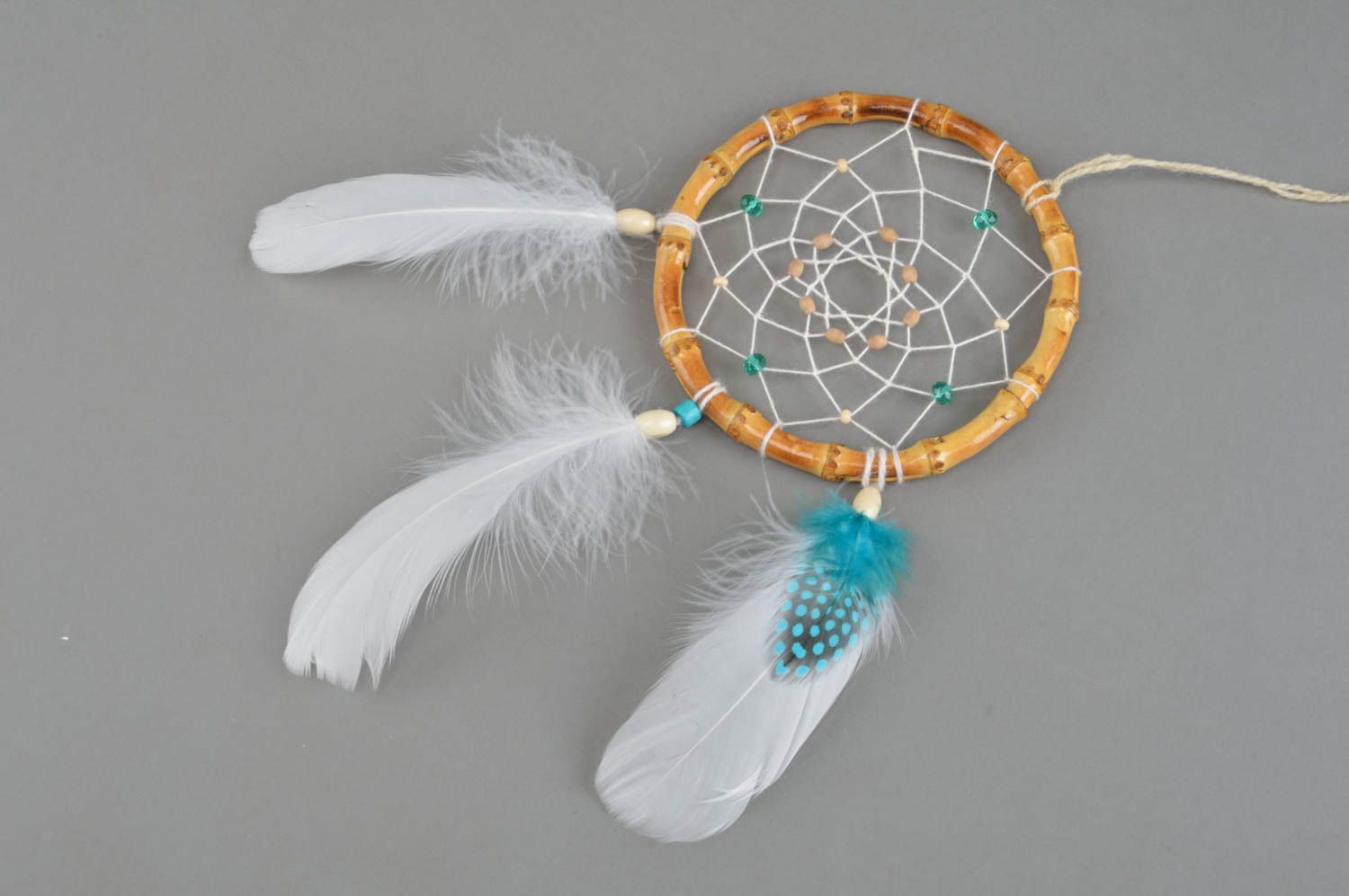 Handmade dreamcatcher interior pendant with feathers of goose and guinea hen photo 2
