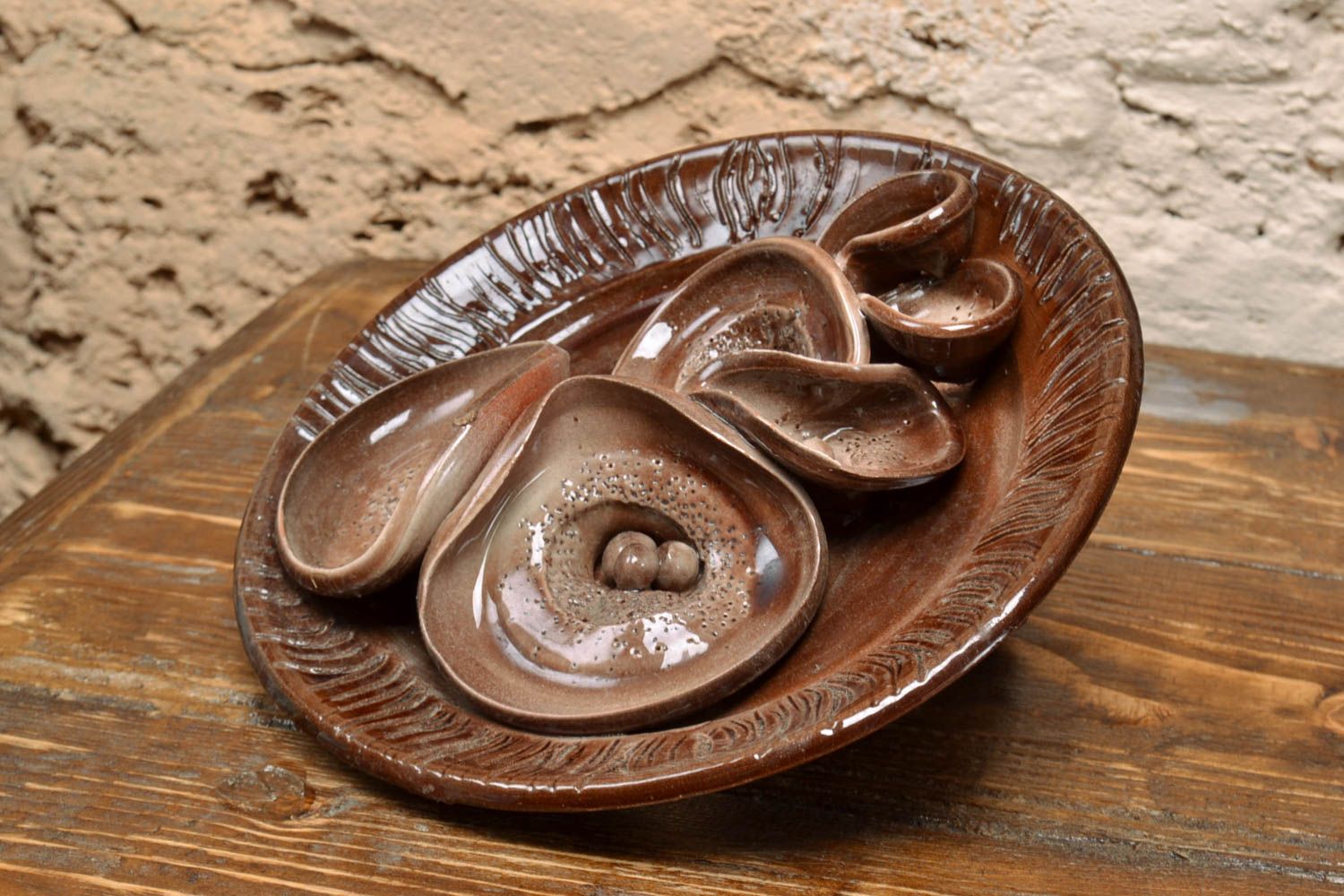 Unusual small handmade decorative clay wall plate of brown color interior design photo 1