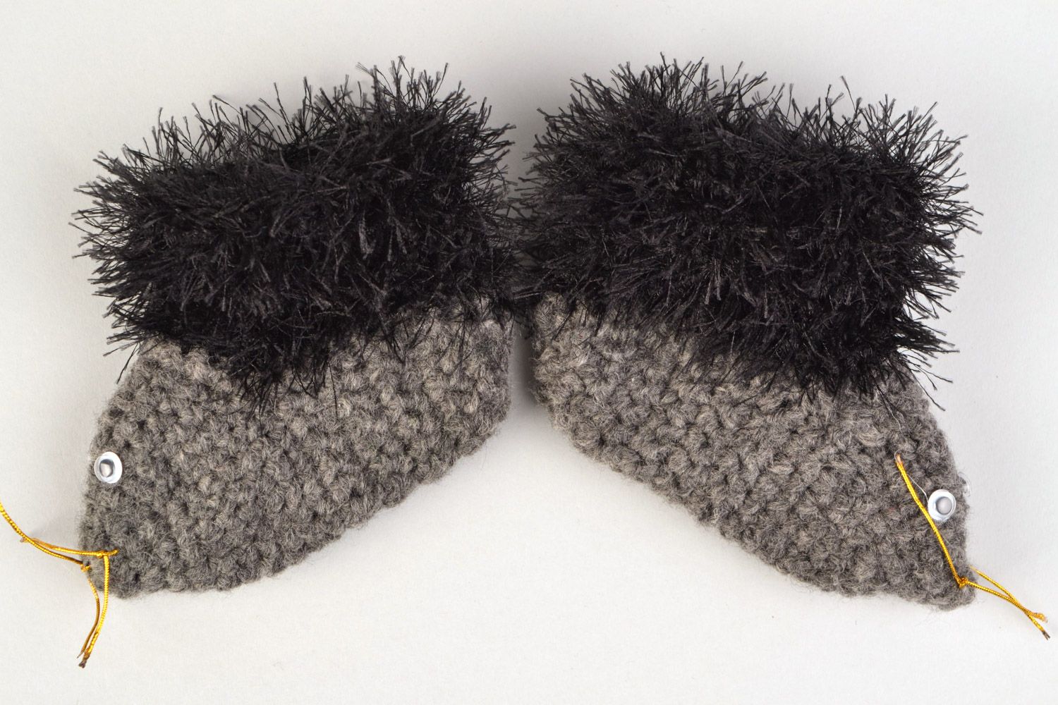 Handmade crochet baby shoes in the shape of gray hedgehogs with black edges photo 3