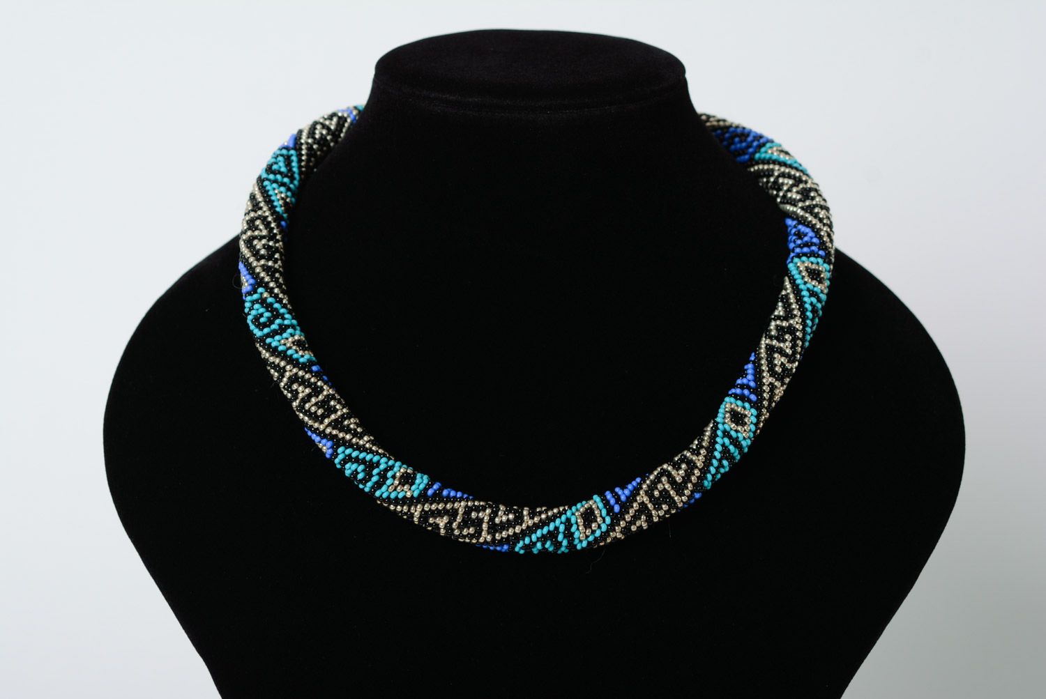 Evening handmade cord necklace woven of beads with ornament in blue color palette photo 1