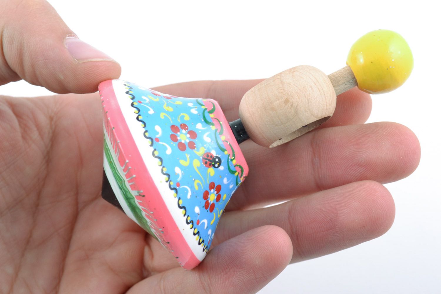 Small wooden painted with eco dyes spinning top toy handmade for children photo 2