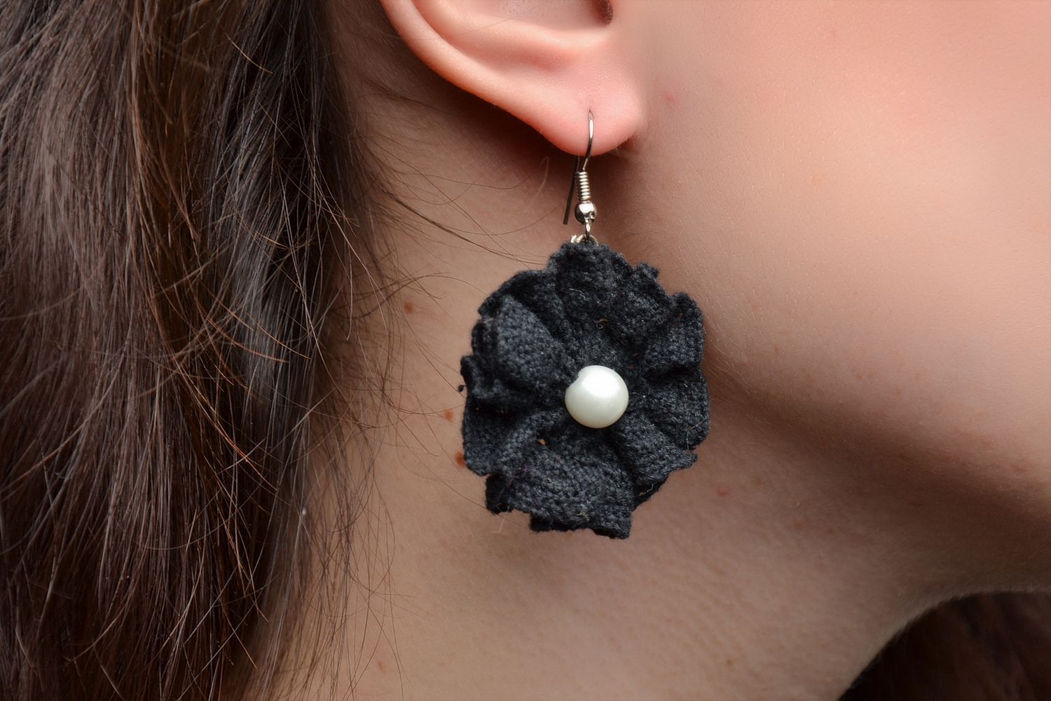 Beautiful lace earrings with pearls in the shape of black flowers photo 2