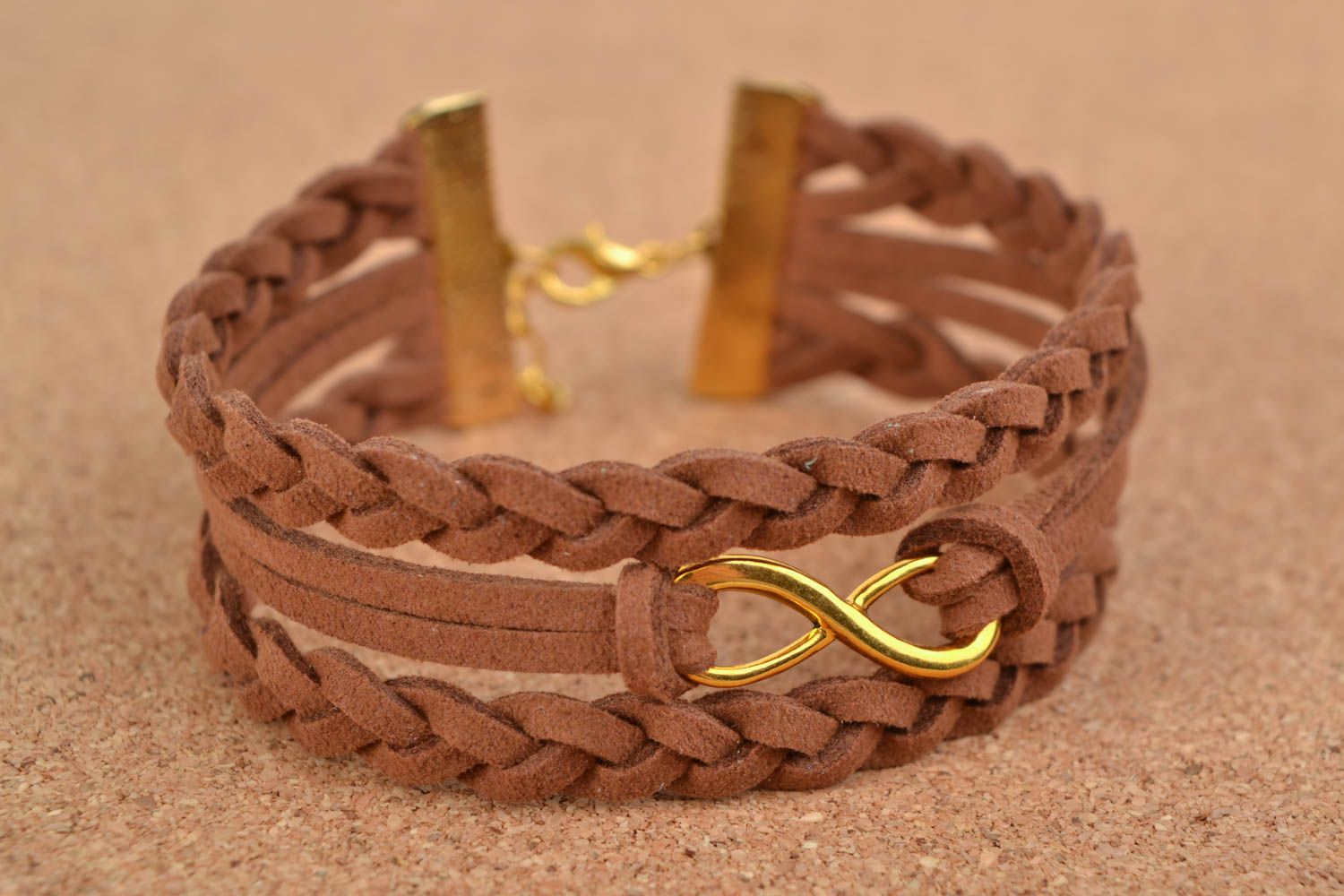 Brown woven suede cord bracelet with metal charm handmade photo 1