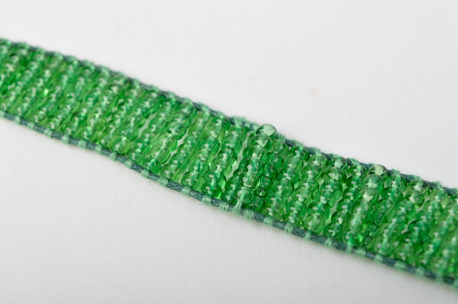 Light green homemade strand beaded bracelet with bronze token photo 4