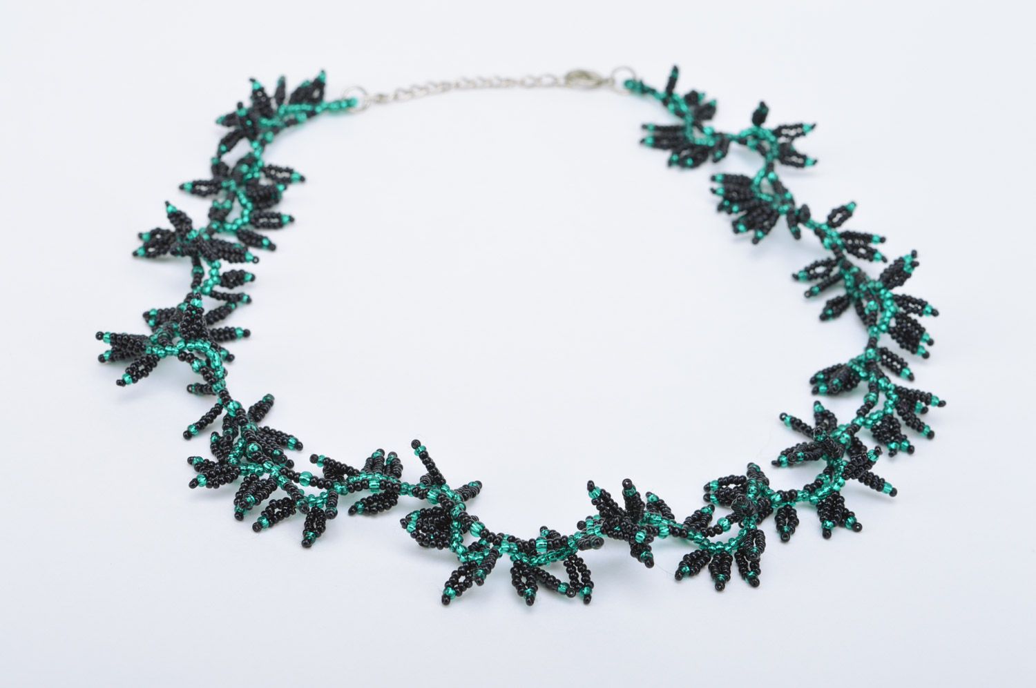 Handmade necklace woven of black and green Czech beads Leaves for women photo 2
