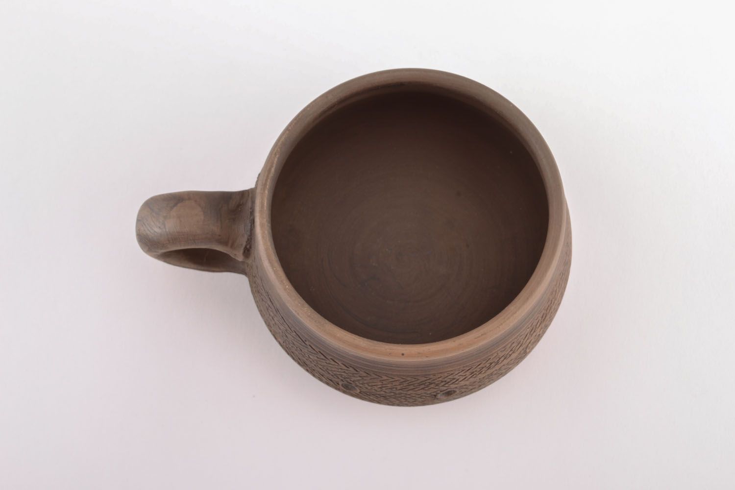 Clay 4 oz coffee cup in light brown color with ancient pattern and handle photo 3