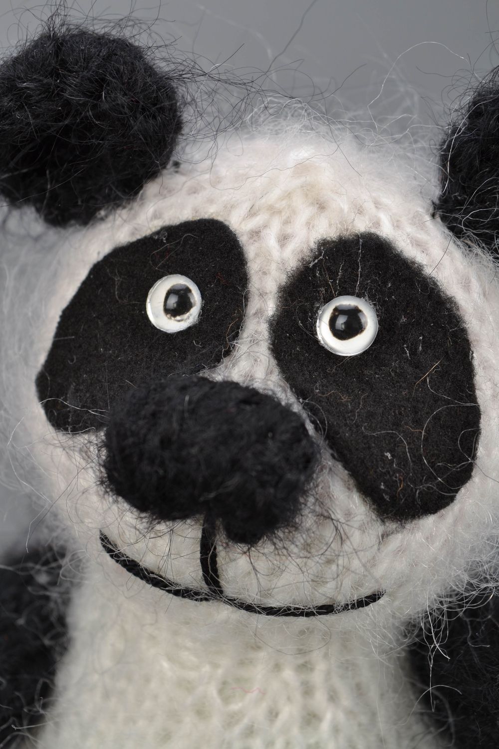 Gehäkeltes Spielzeug Pandabär foto 3