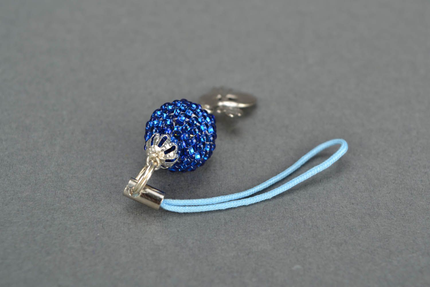Cell phone charm of blue color photo 4