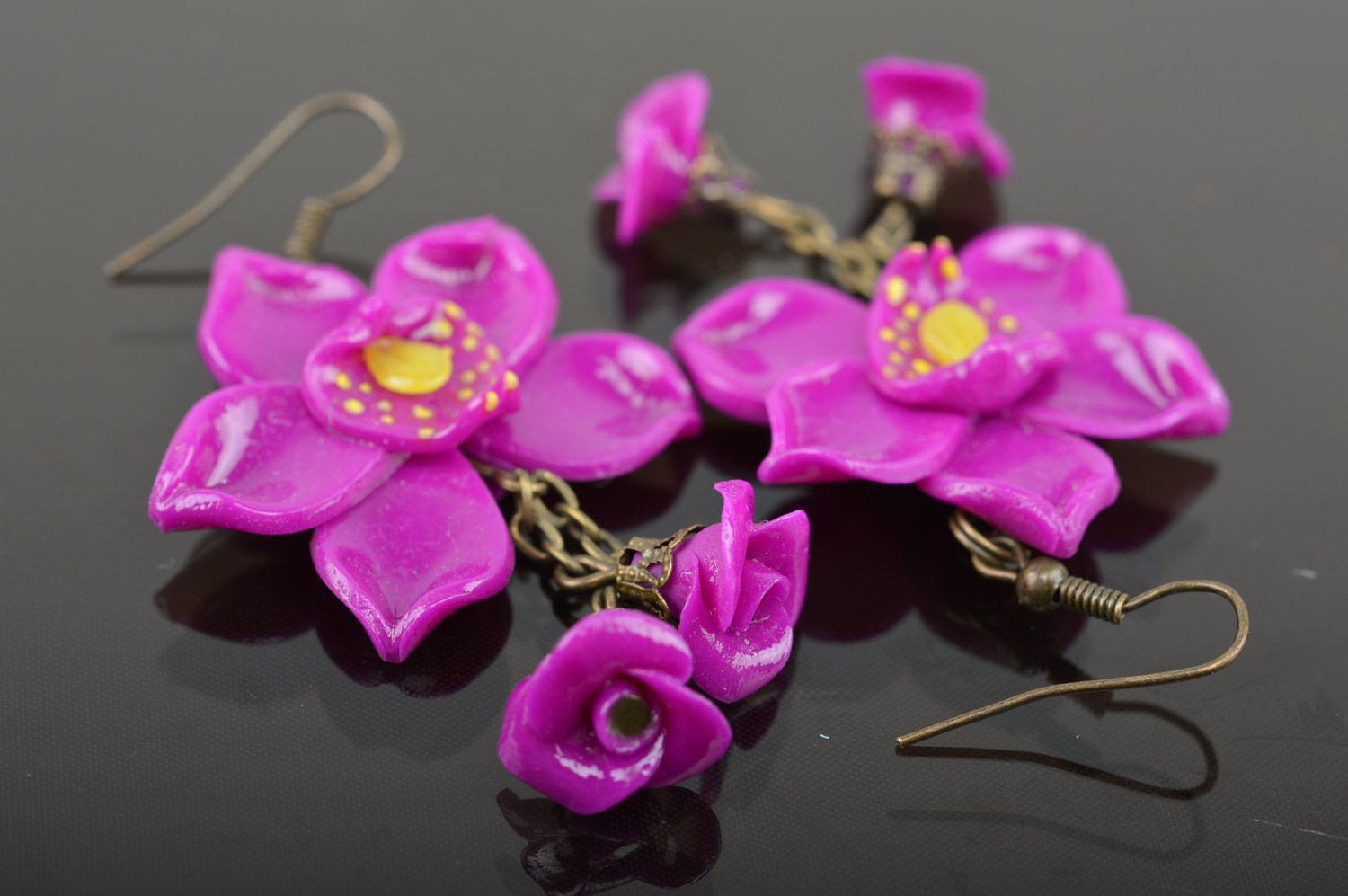 Homemade long plastic flower earrings with charms in the shape of orchids photo 5