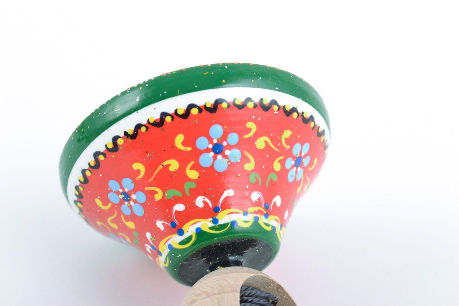 Wooden handmade spinning top decorated with eco-friendly paints  motor development photo 4