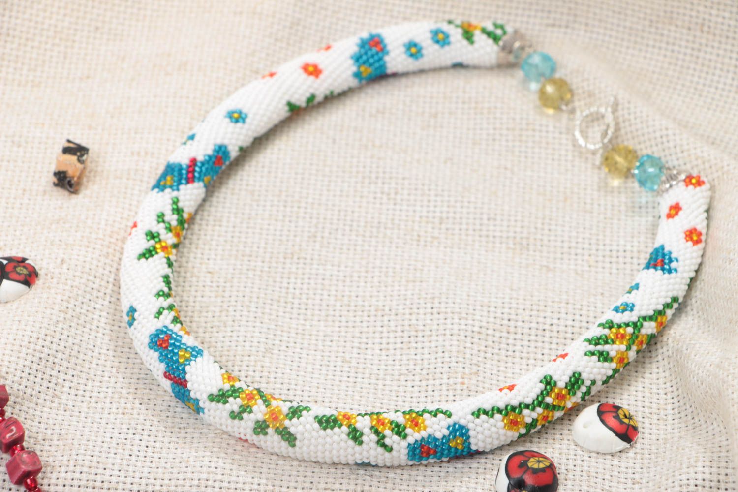 Handmade white beaded cord necklace with stylish colorful inserts for women photo 1