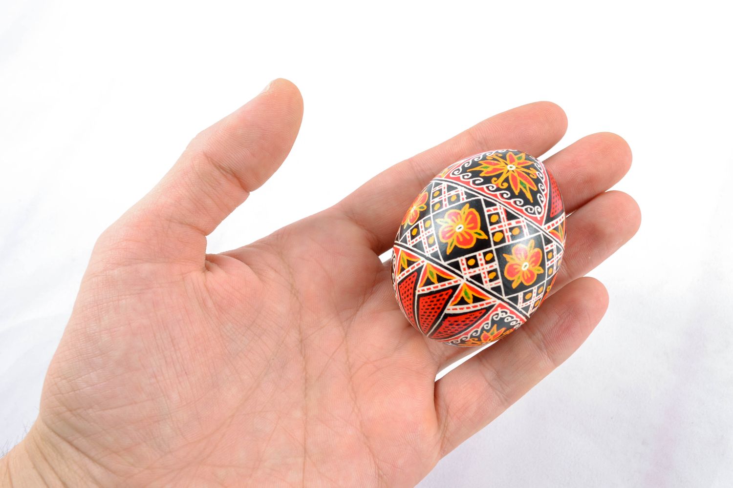 Handmade decorative painted egg with patterns in Ukrainian style photo 5