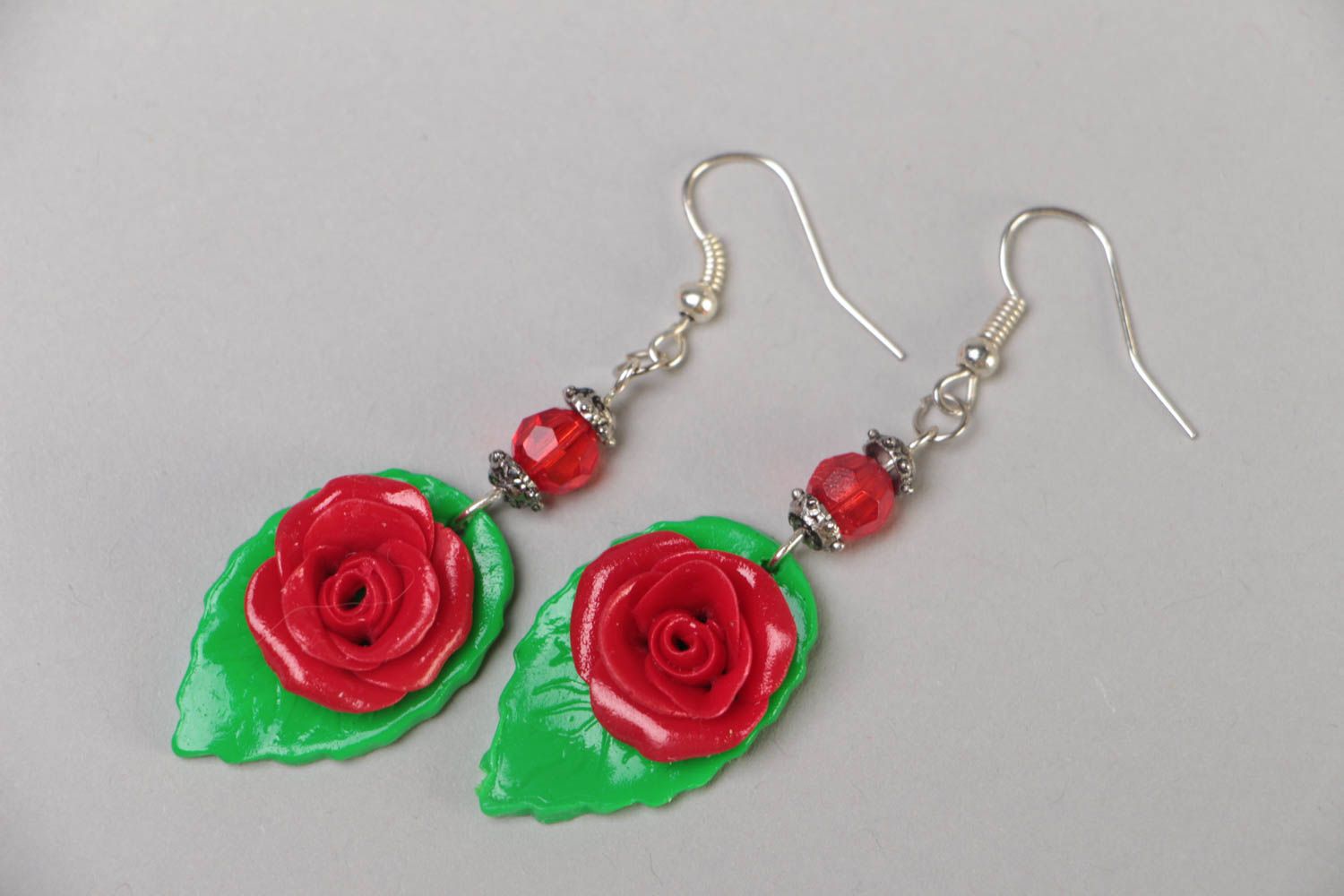 Handmade designer festive polymer clay dangling earrings with red flowers  photo 2