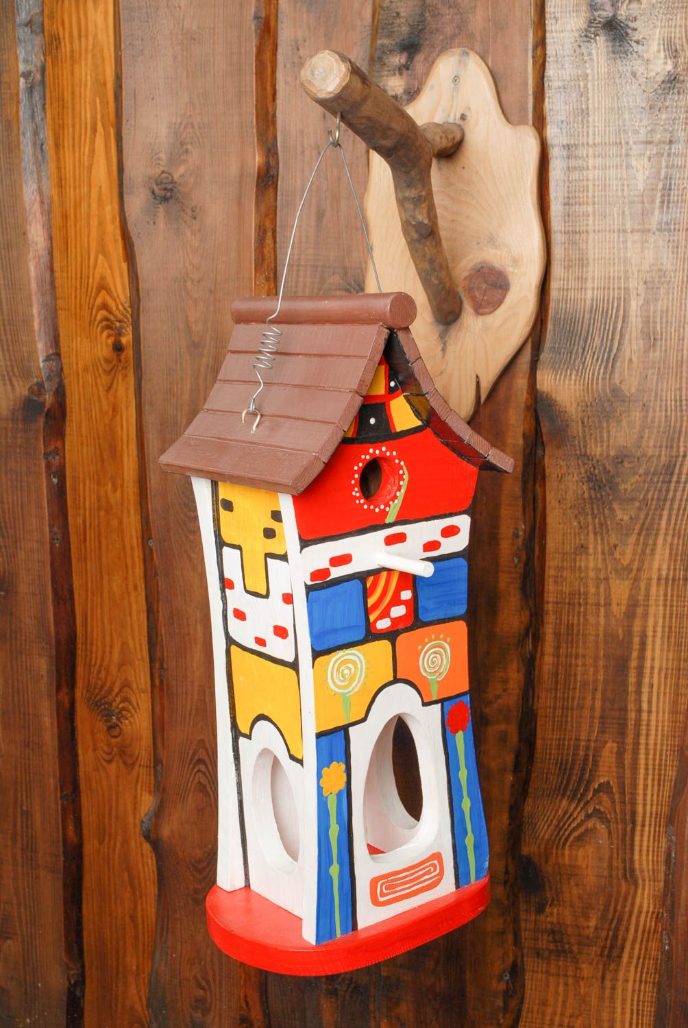 Bright painted birdhouse photo 1