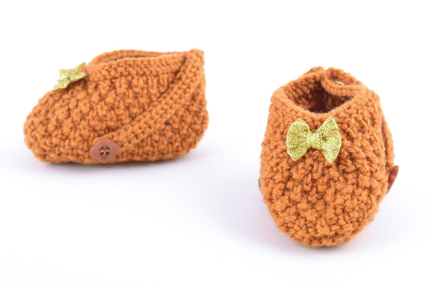 Handmade warm baby booties knitted of wool of light brown color for little girl photo 2