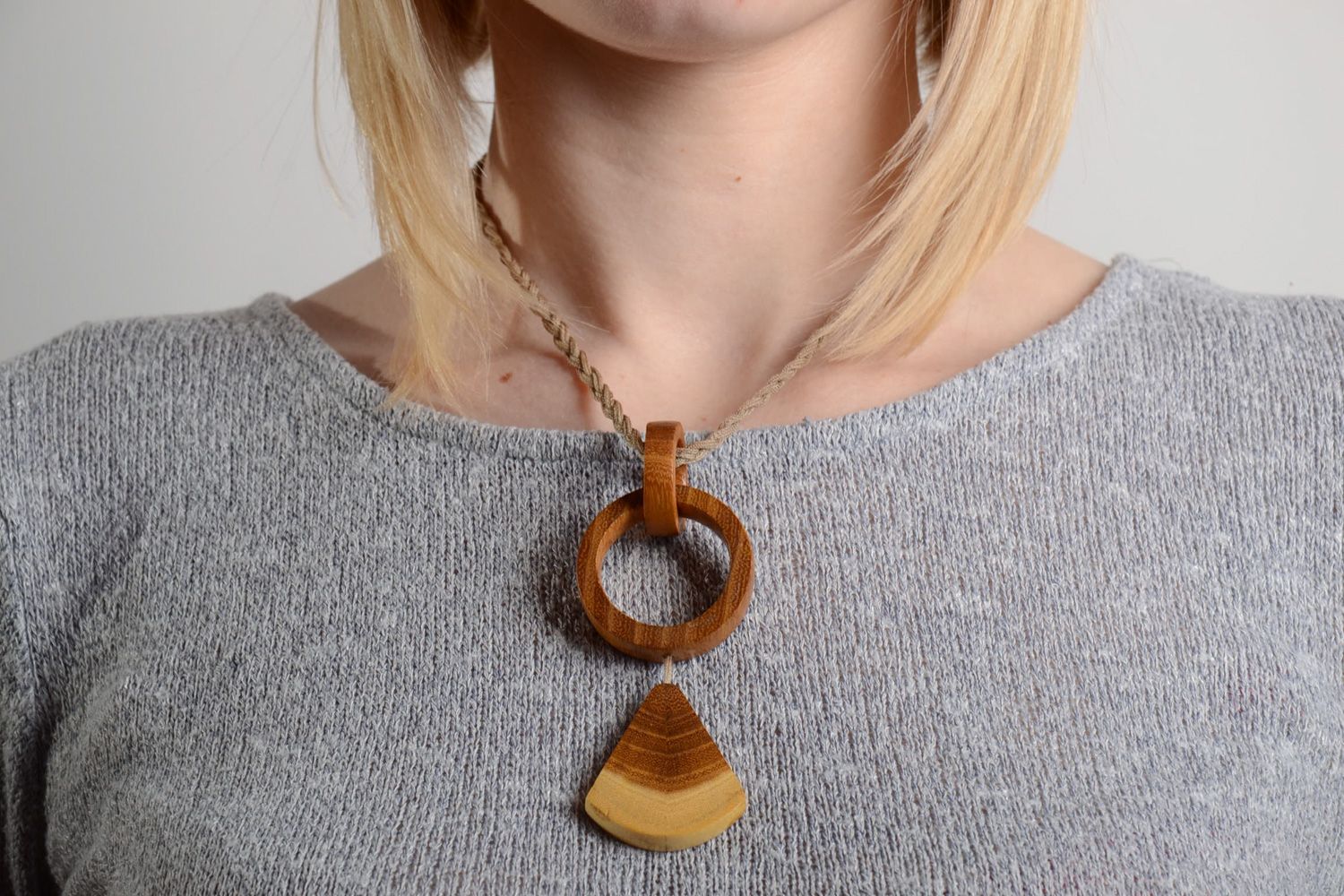 Handmade designer neck pendant carved of wood with ring elements for women photo 2