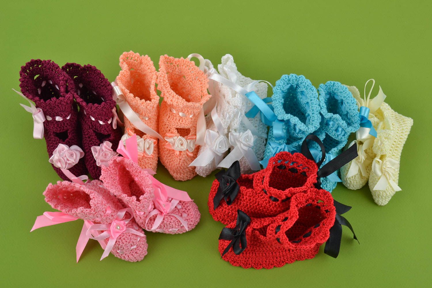 Set of handmade colorful bright crocheted baby booties with ribbons 7 pairs photo 1