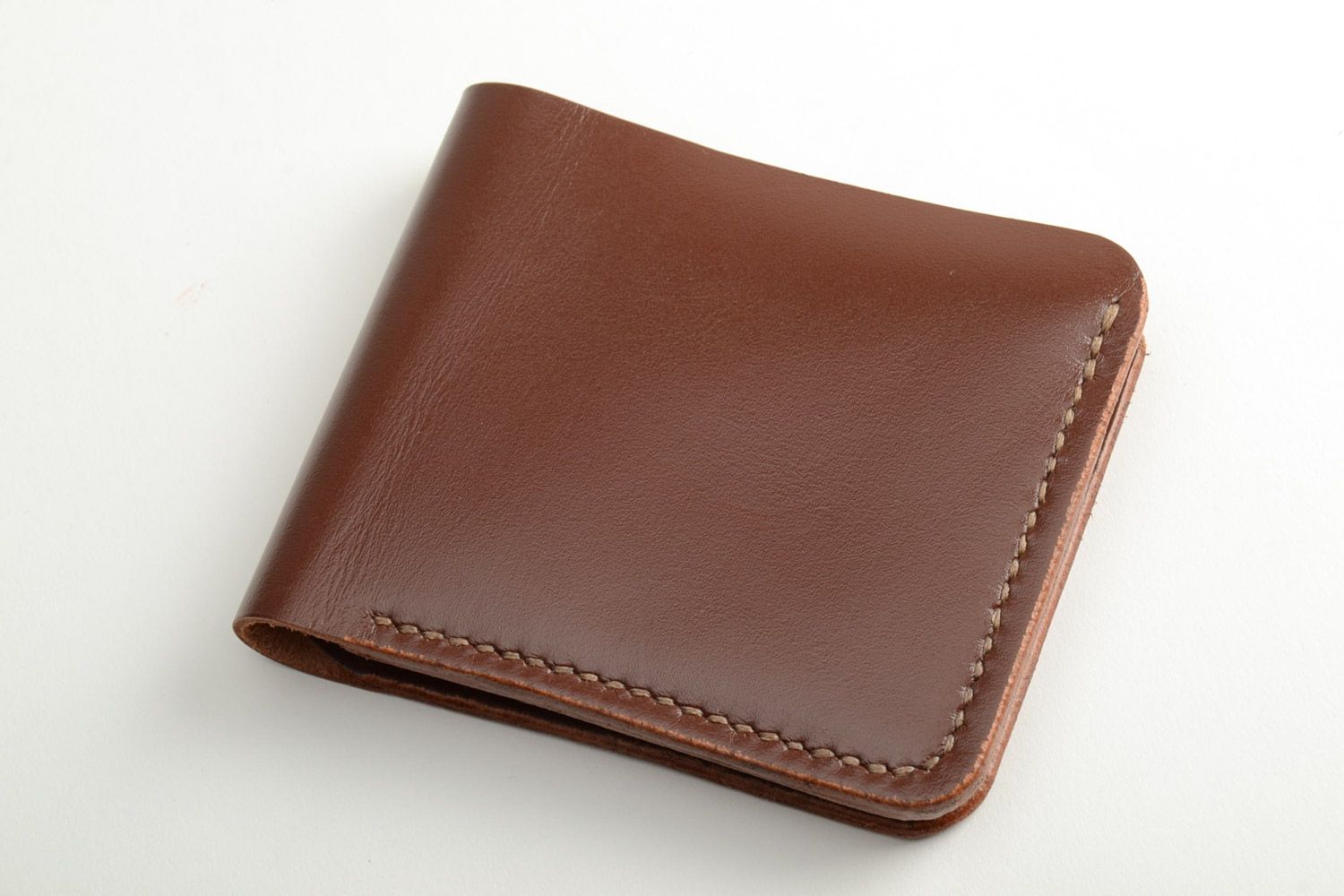 Мужской бумажник из натуральной кожи коричневый на три отделения ручной работы фото 2