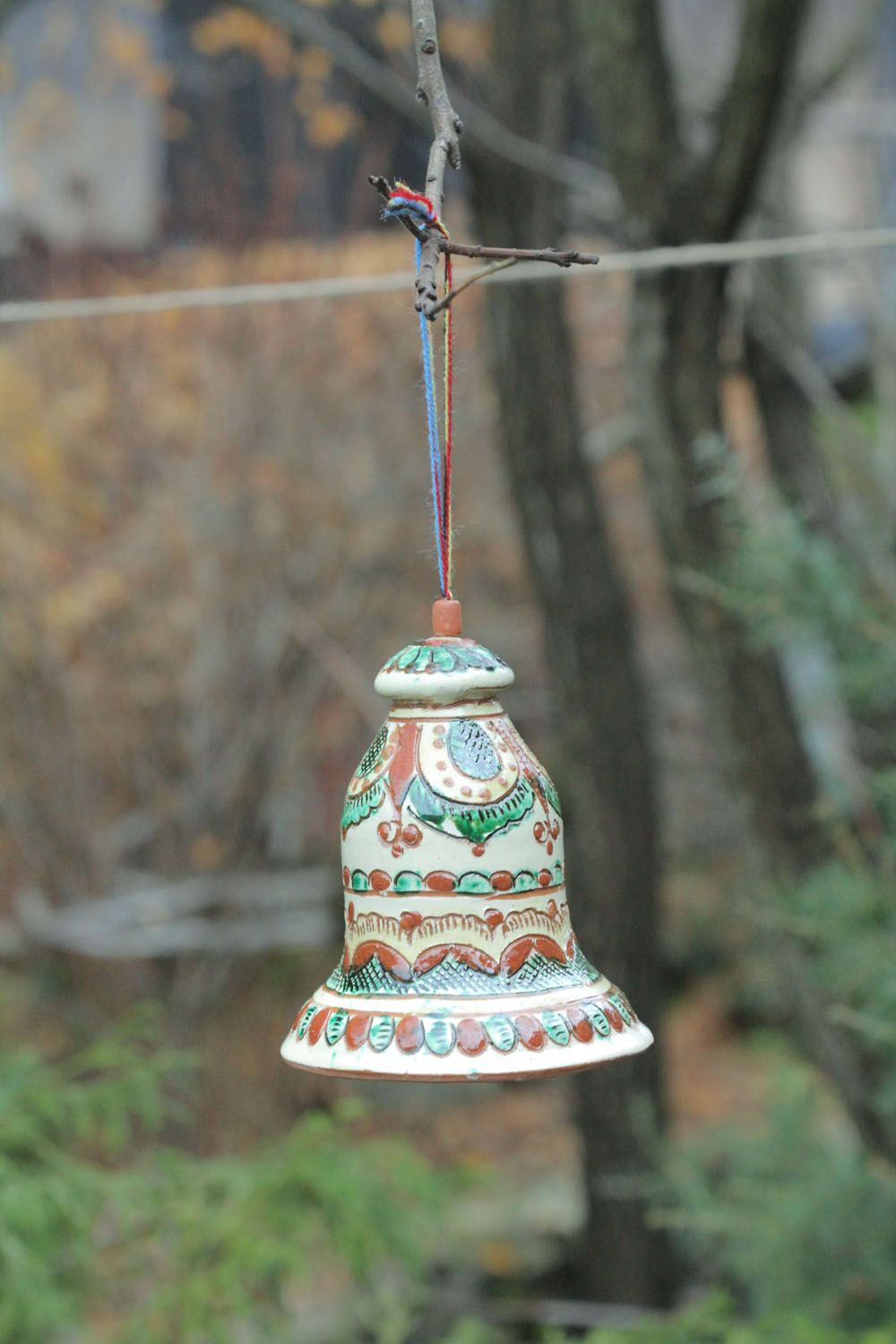 Decorative clay bell photo 1