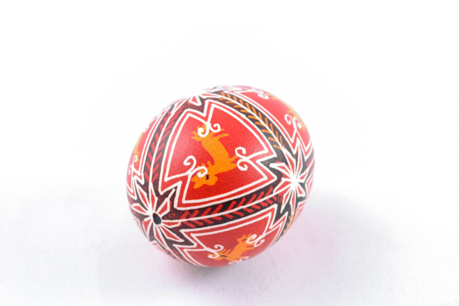 Handmade Easter egg painted in red color palette photo 3