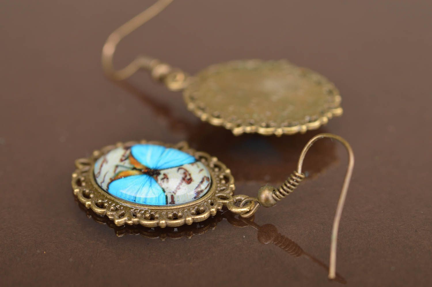 Beautiful stylish vintage handmade oval metal earrings with butterflies image photo 4