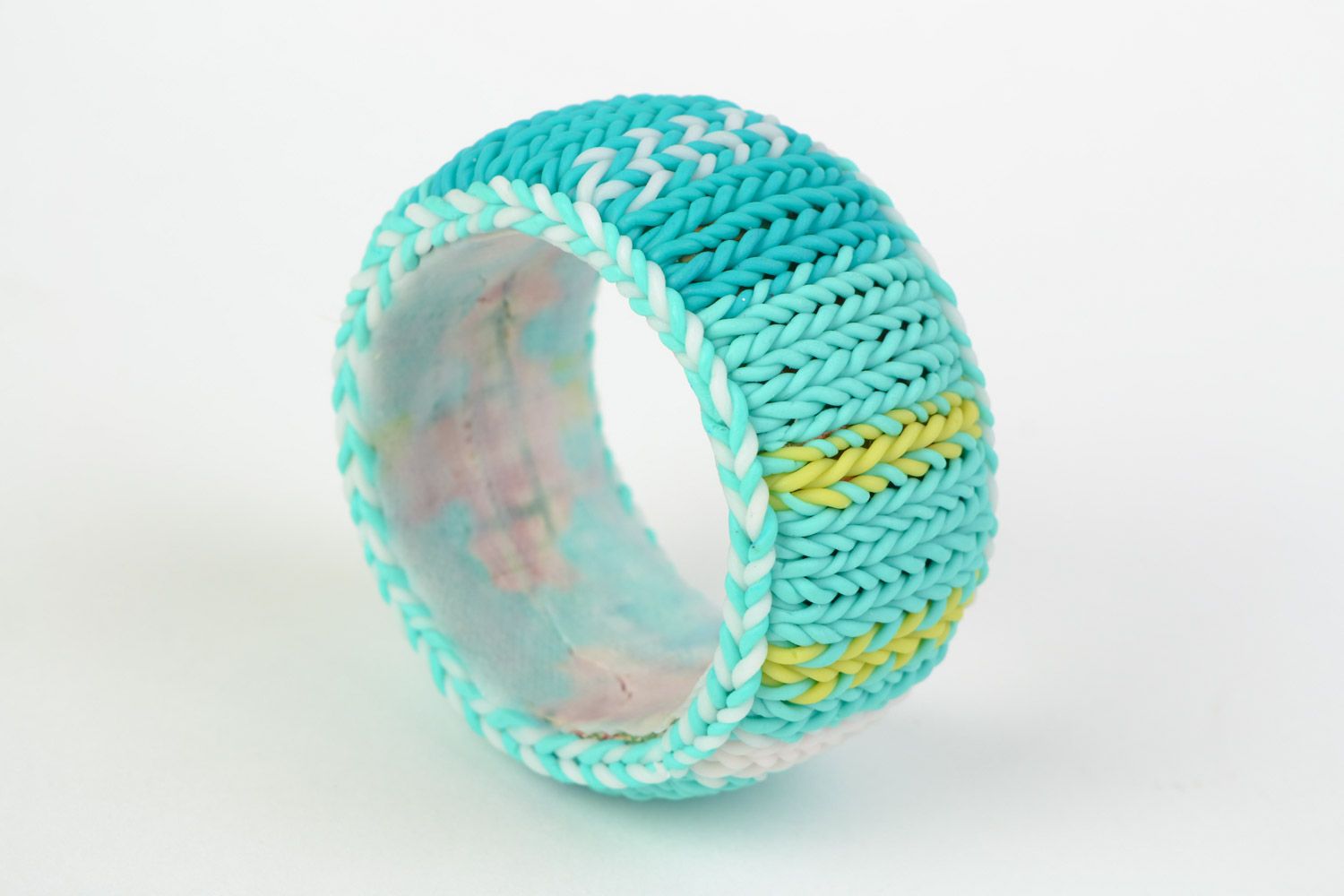 Bangle wide wrist bracelet on the wooden basis with knitted cover in blue and turquoise color photo 1