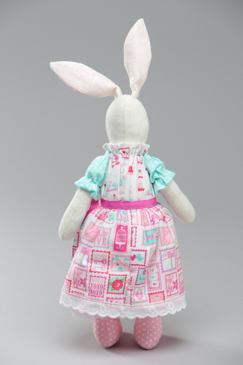 Cute handmade soft toy sewn of natural fabrics Rabbit with pink ears and dress photo 4