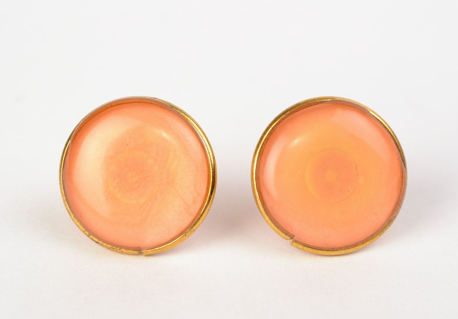Handmade metal stud earrings of peach color with jewelry glaze for women photo 1